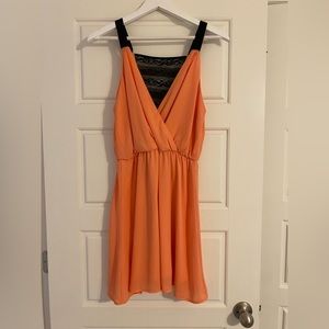 Final Touch dress with V neck front and lace back